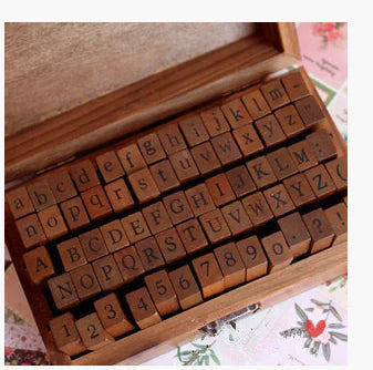 70-Piece Stamp Set with Numbers, Letters, and Box
